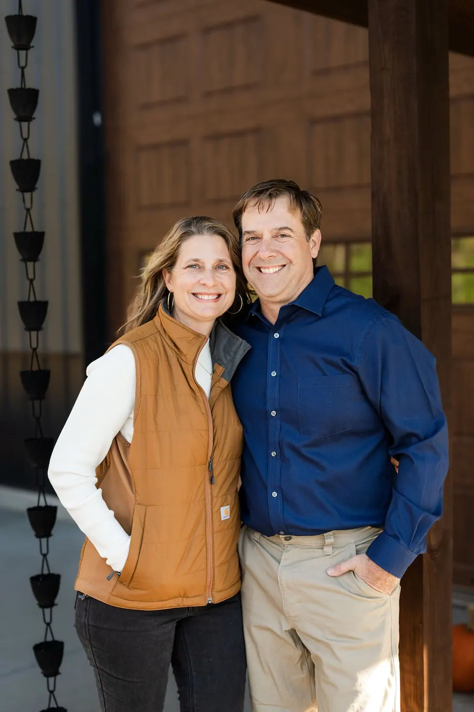 Holly and her husband on the porch