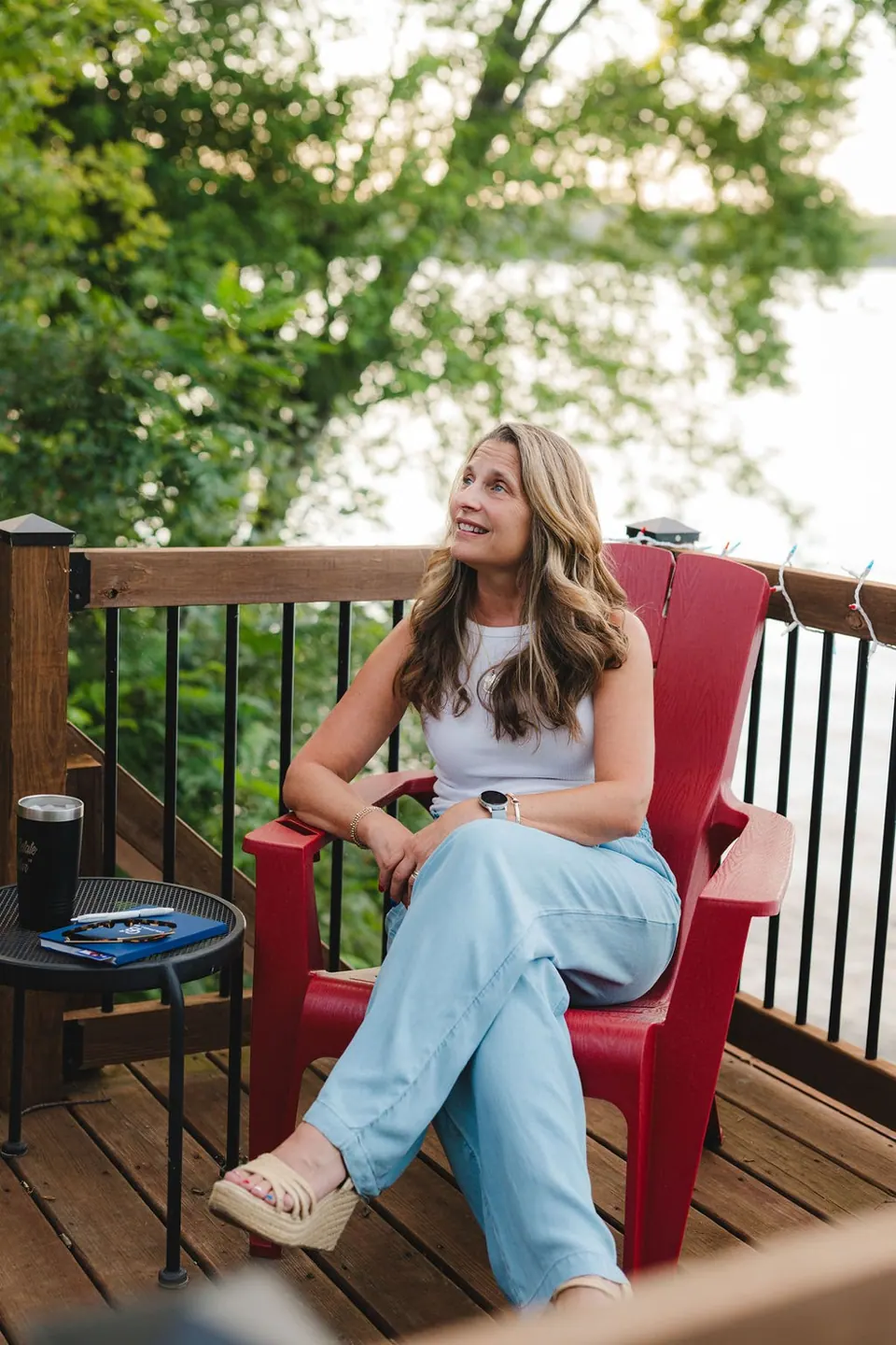Holly on the deck above the lake