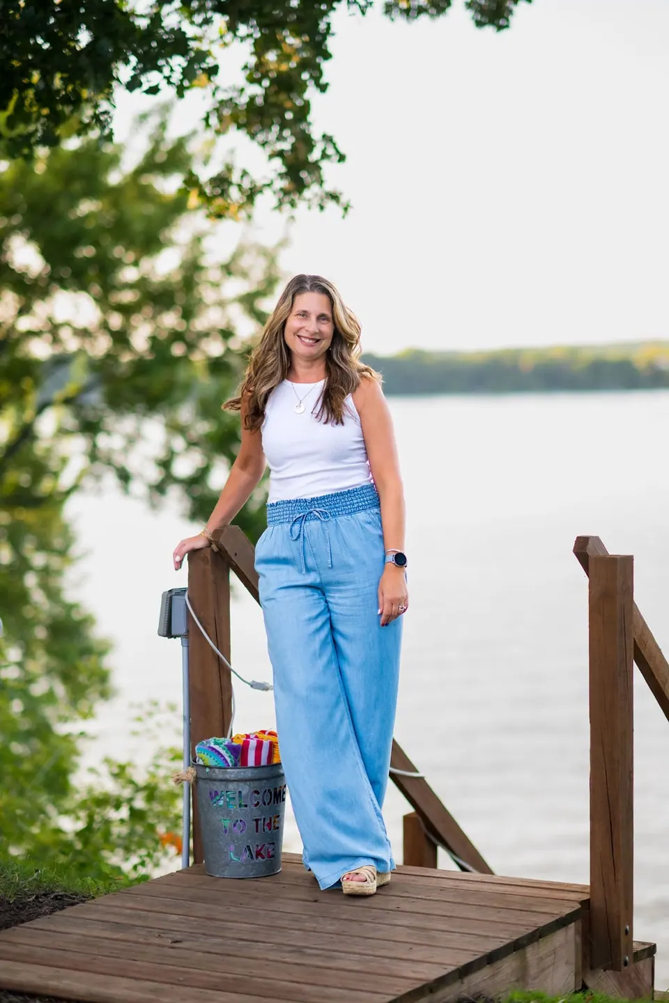 Holly on the dock at the lake